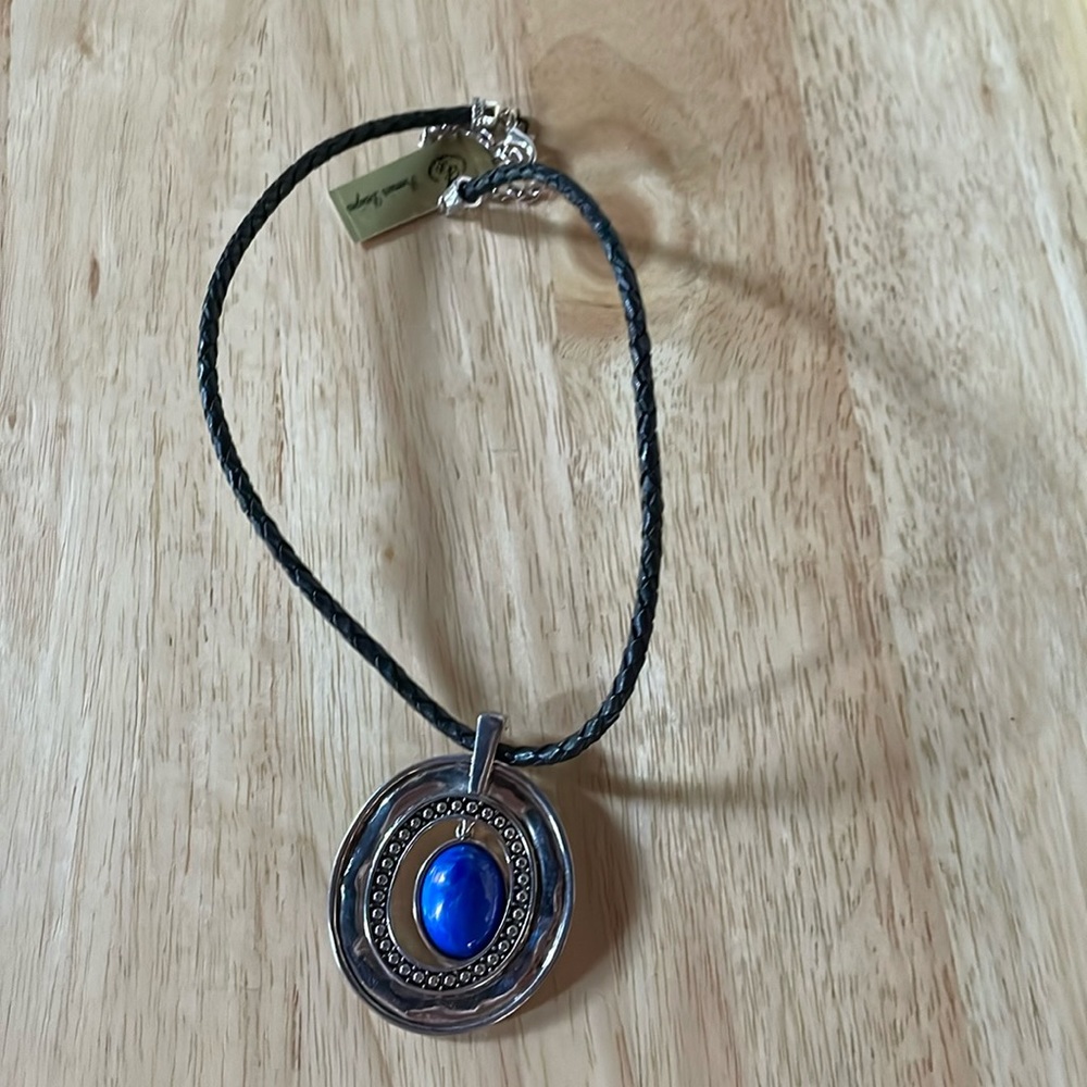 Vintage 16”-18” necklace with leather cord & silver toned & blue colored pendant